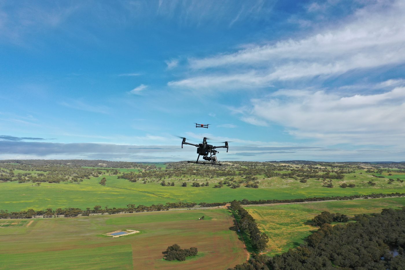 SkyFaring multi-rotor RPA aircraft in flight over farmland